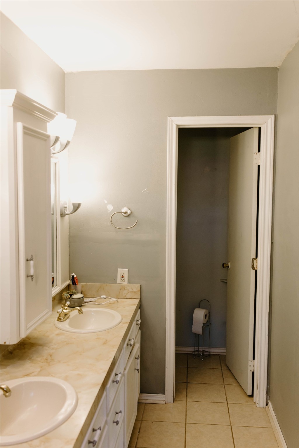 16120 Hartman Road Magnolia, TX 77355 - Photo 19 of 41 a bathroom with a sink and a mirror