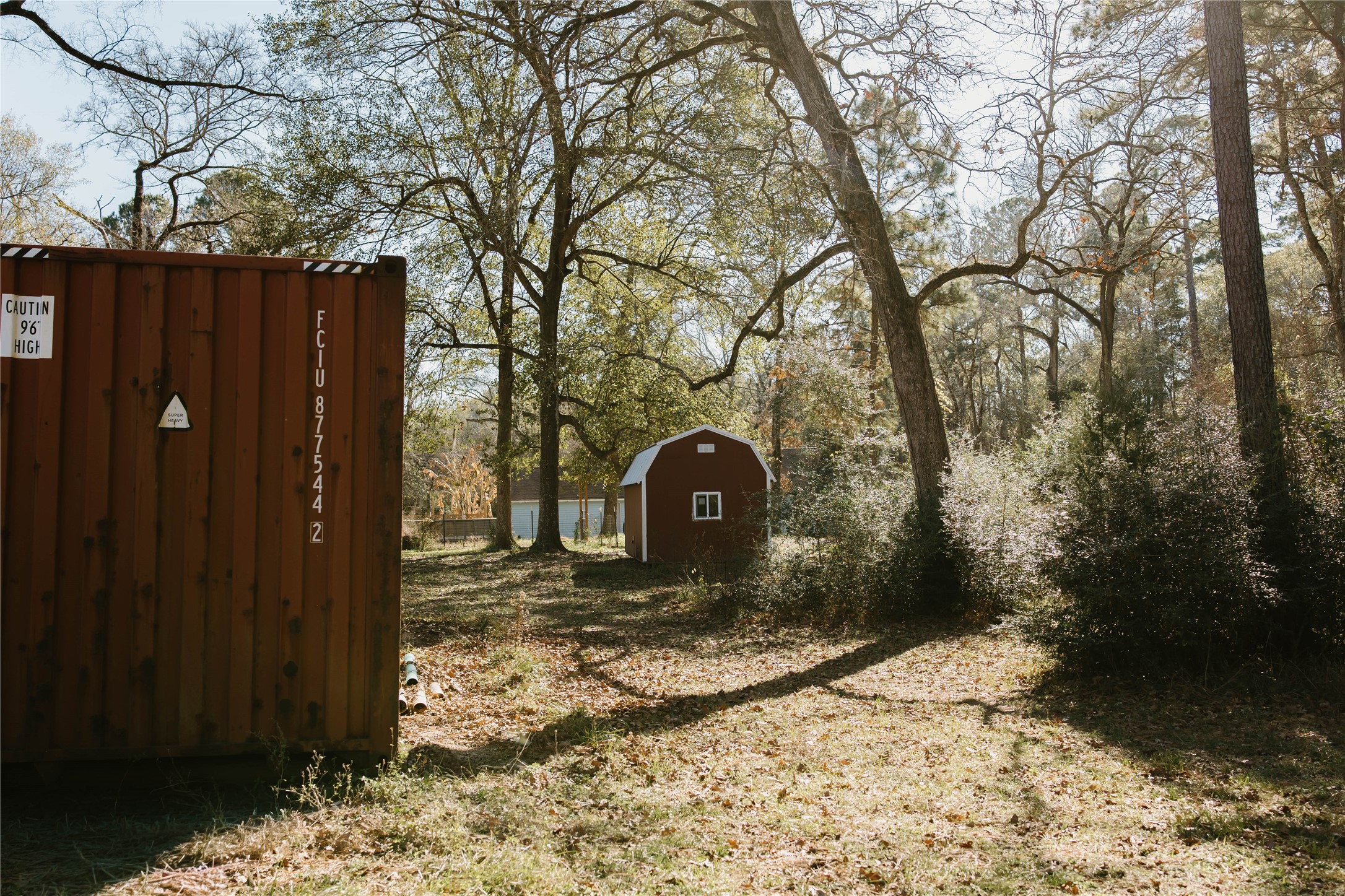 16120 Hartman Road Magnolia, TX 77355 - Photo 40 of 41 a view of a wooden fence next to a yard