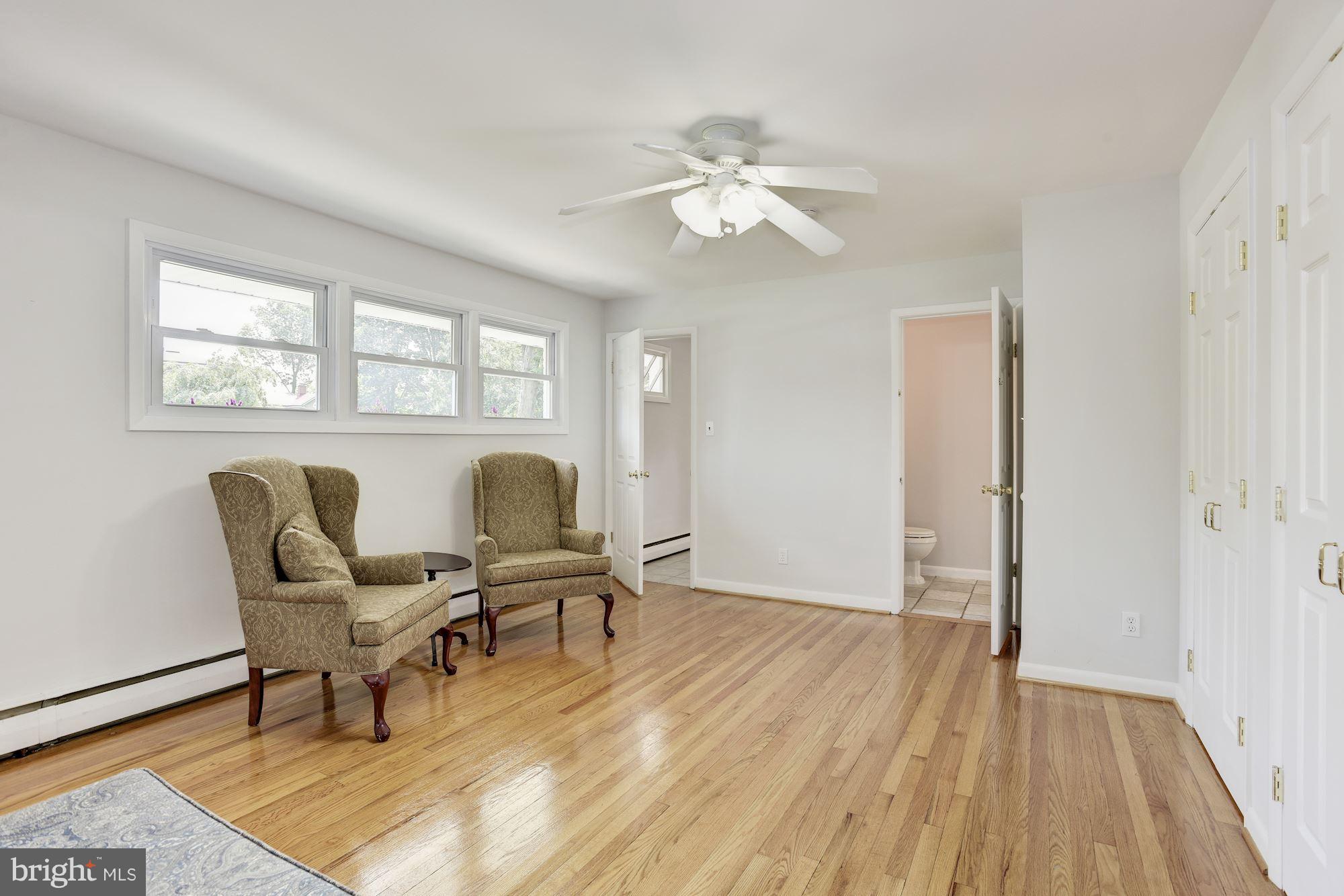 3618 Macalpine Road Ellicott City, MD 21042 - Photo 14 of 30 a workspace with wooden floor and a window