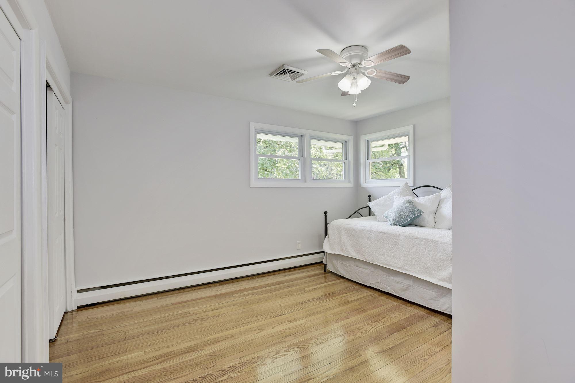 3618 Macalpine Road Ellicott City, MD 21042 - Photo 18 of 30 a view of livingroom with window and ceiling fan