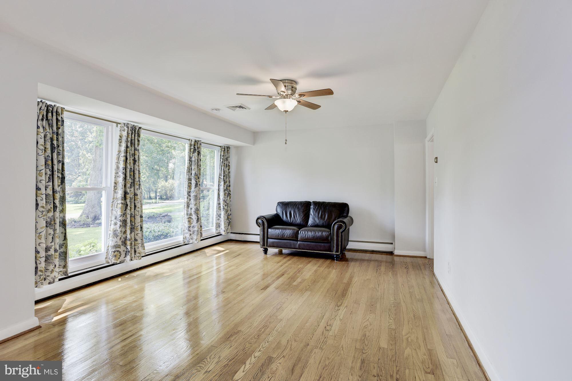 3618 Macalpine Road Ellicott City, MD 21042 - Photo 3 of 30 a living room with furniture and a large window