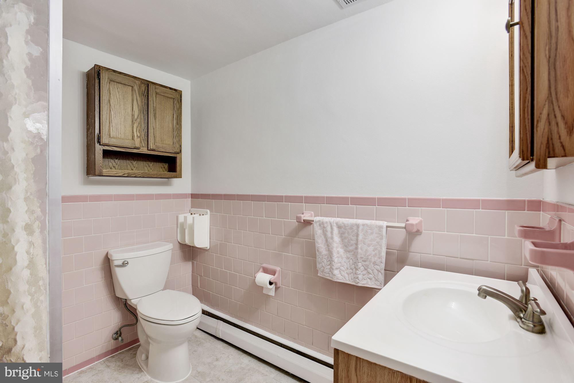 3618 Macalpine Road Ellicott City, MD 21042 - Photo 27 of 30 a bathroom with a sink and a toilet