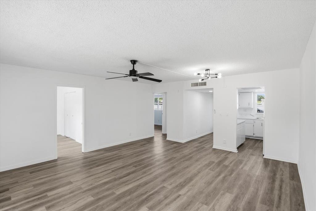 4161 Northwest 26th Street, Unit 105 Lauderhill, FL 33313 - Photo 15 of 26 a view of empty room with wooden floor