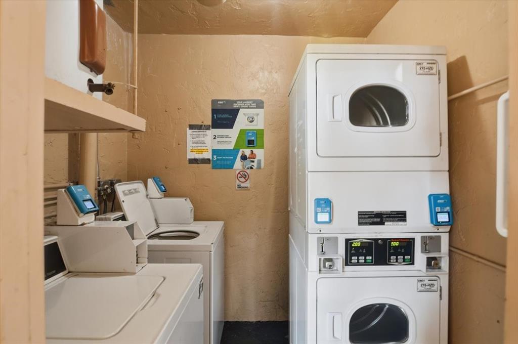 4161 Northwest 26th Street, Unit 105 Lauderhill, FL 33313 - Photo 26 of 26 a utility room with dryer and washer