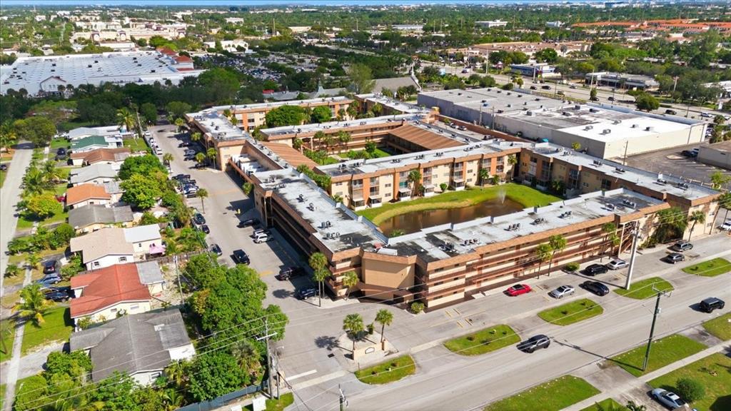 4161 Northwest 26th Street, Unit 105 Lauderhill, FL 33313 - Photo 4 of 26 an aerial view of a swimming pool and outdoor space