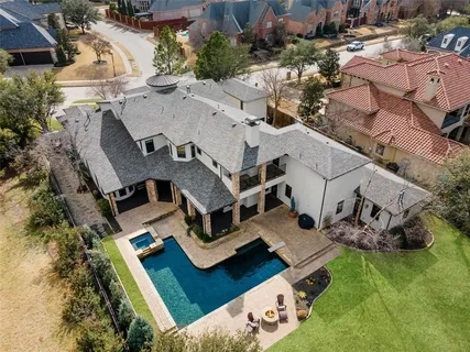 an aerial view of residential house with outdoor space