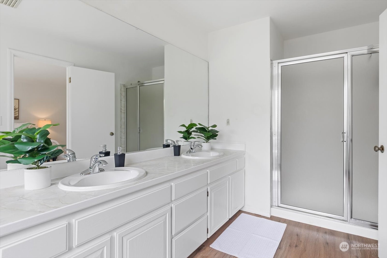 2480 215th Place Southwest Brier, WA 98036 - Photo 26 of 40 a bathroom with a sink a vanity and a mirror