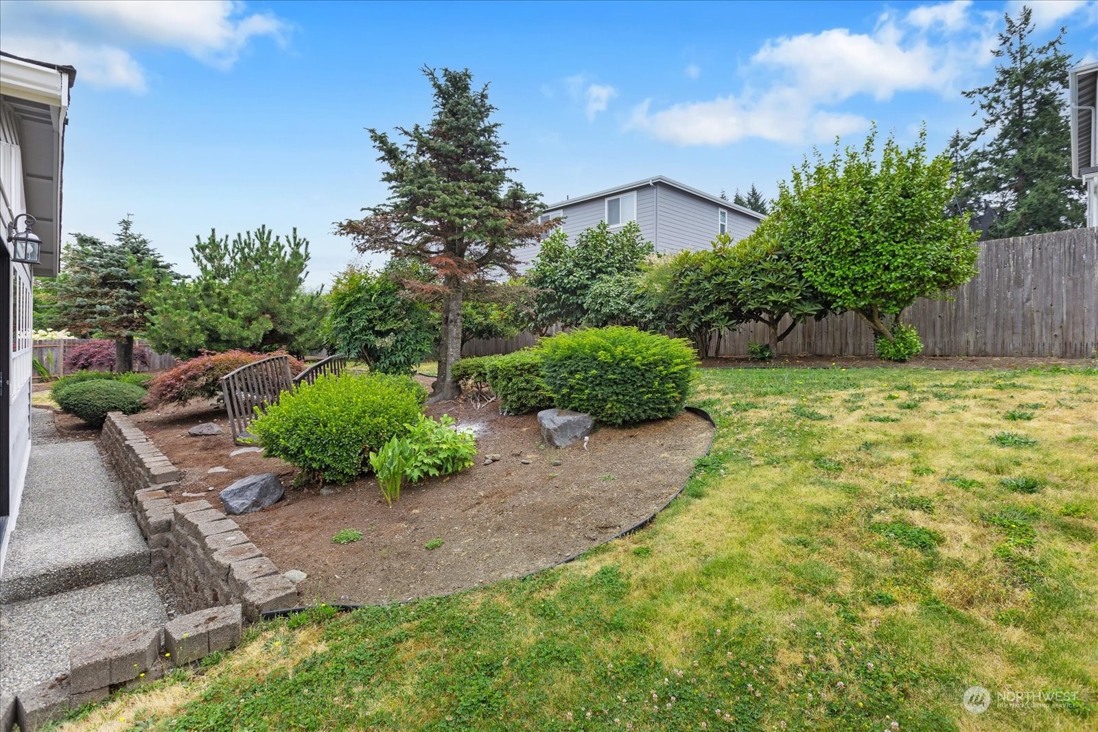 2480 215th Place Southwest Brier, WA 98036 - Photo 35 of 40 a view of a backyard with plants