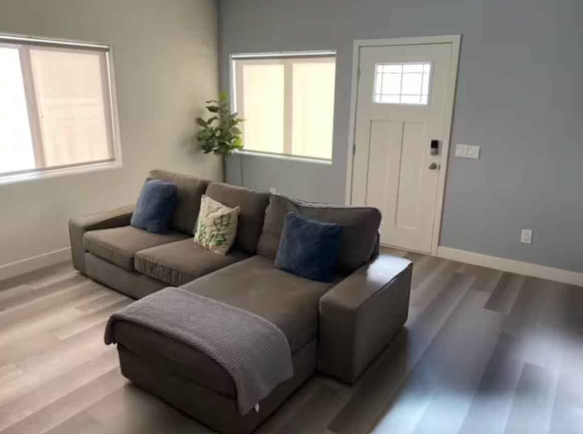 61786 Desert Air Road Joshua Tree, CA 92252 - Photo 12 of 54 a living room with furniture and a window