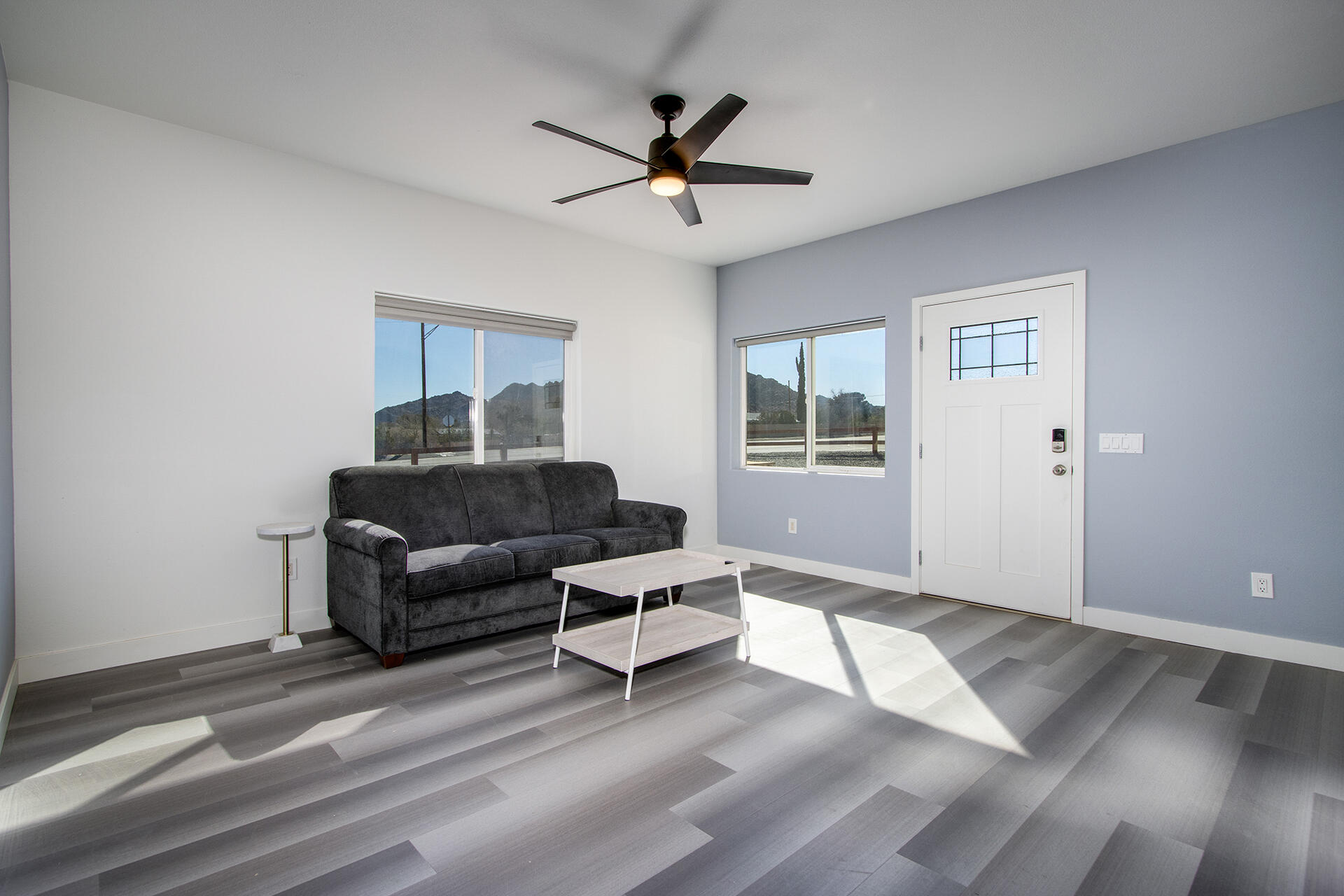 61786 Desert Air Road Joshua Tree, CA 92252 - Photo 14 of 54 a living room with furniture and a window