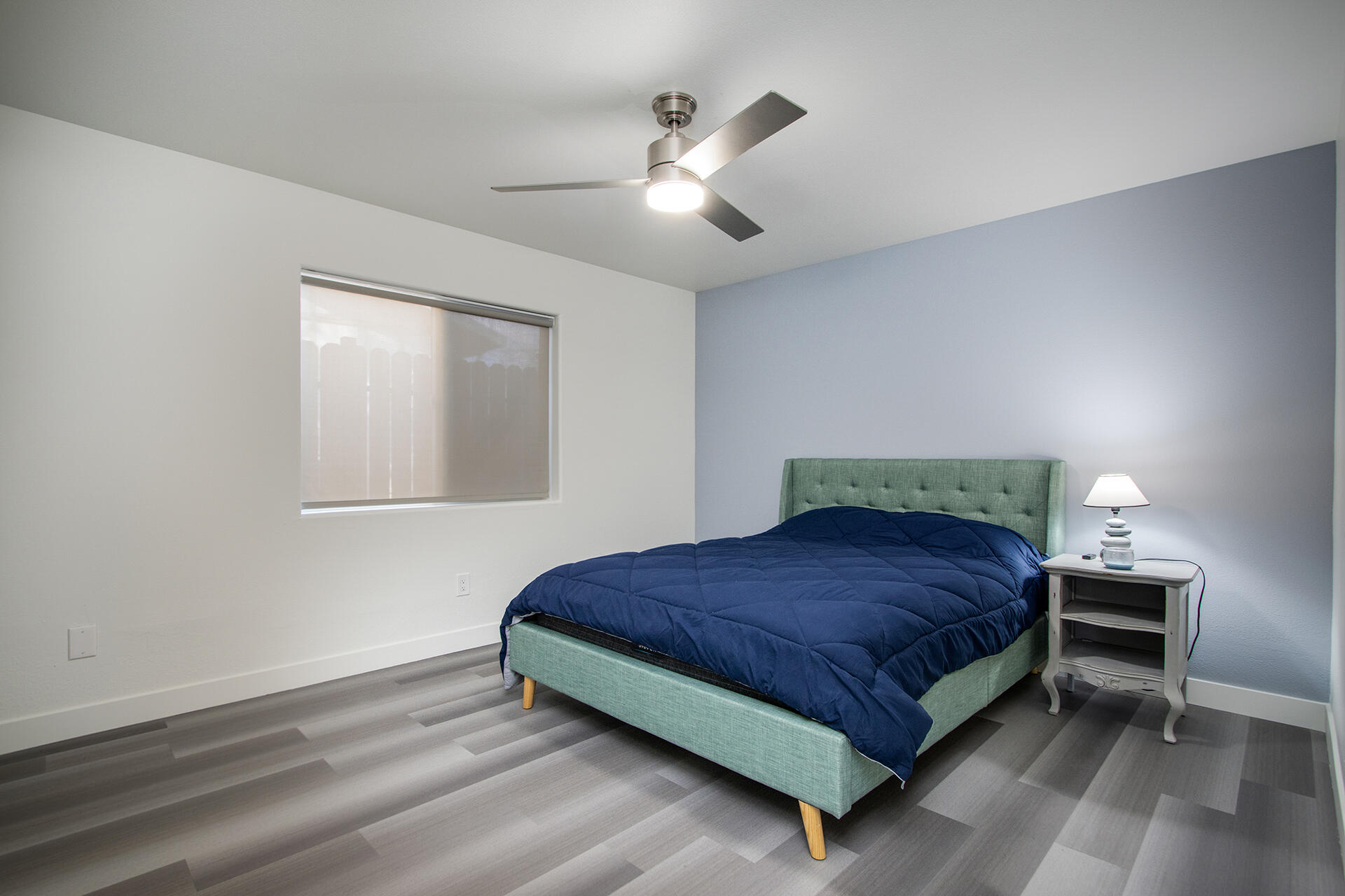 61786 Desert Air Road Joshua Tree, CA 92252 - Photo 24 of 54 a bedroom with a bed and window
