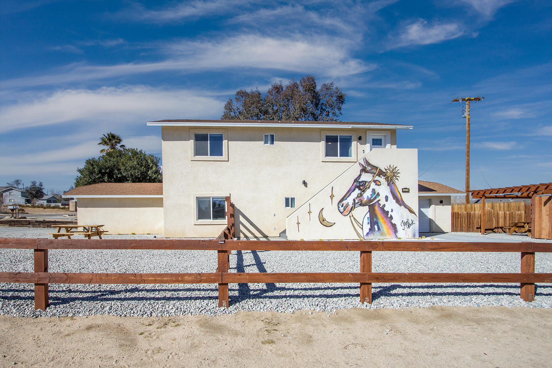 61786 Desert Air Road Joshua Tree, CA 92252 - Photo 4 of 54 a view of a house with a park