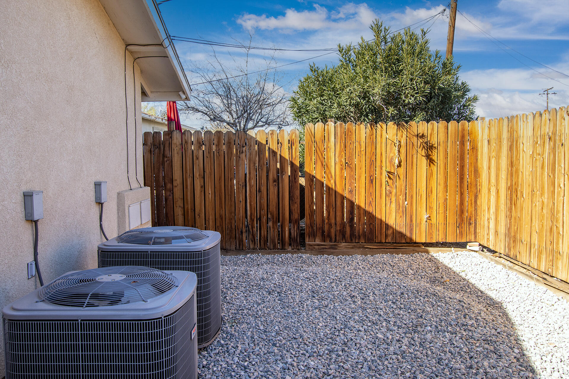 61786 Desert Air Road Joshua Tree, CA 92252 - Photo 49 of 54 a view of wooden floor and chair in the room