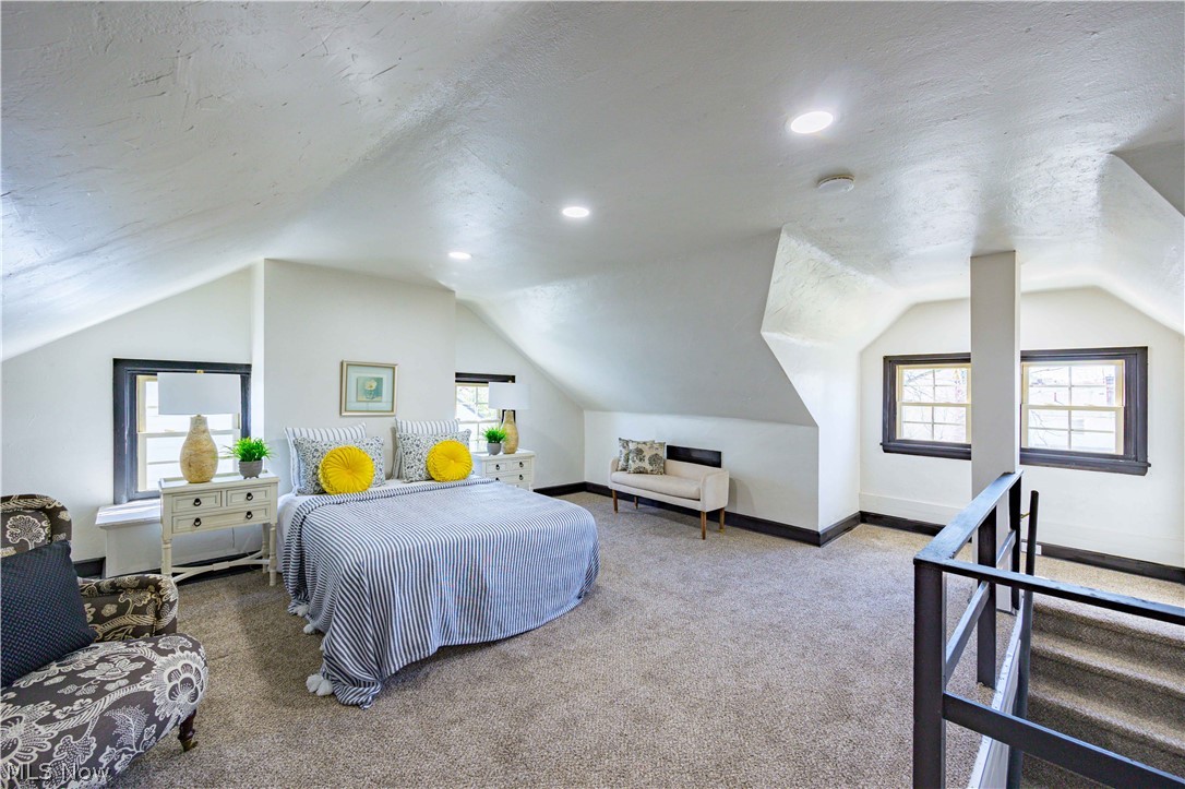 3254 Redwood Road Cleveland Heights, OH 44118 - Photo 19 of 49 Carpeted bedroom featuring vaulted ceiling and multiple windows