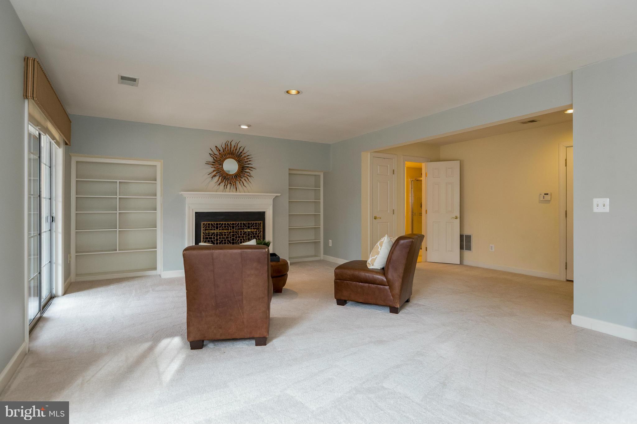 143 Roland Court Southwest Vienna, VA 22180 - Photo 16 of 29 Lower level w/fireplace & full bath