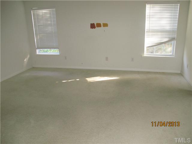 5108 Sansome Trail Raleigh, NC 27610 - Photo 6 of 11 a view of an empty room with a window
