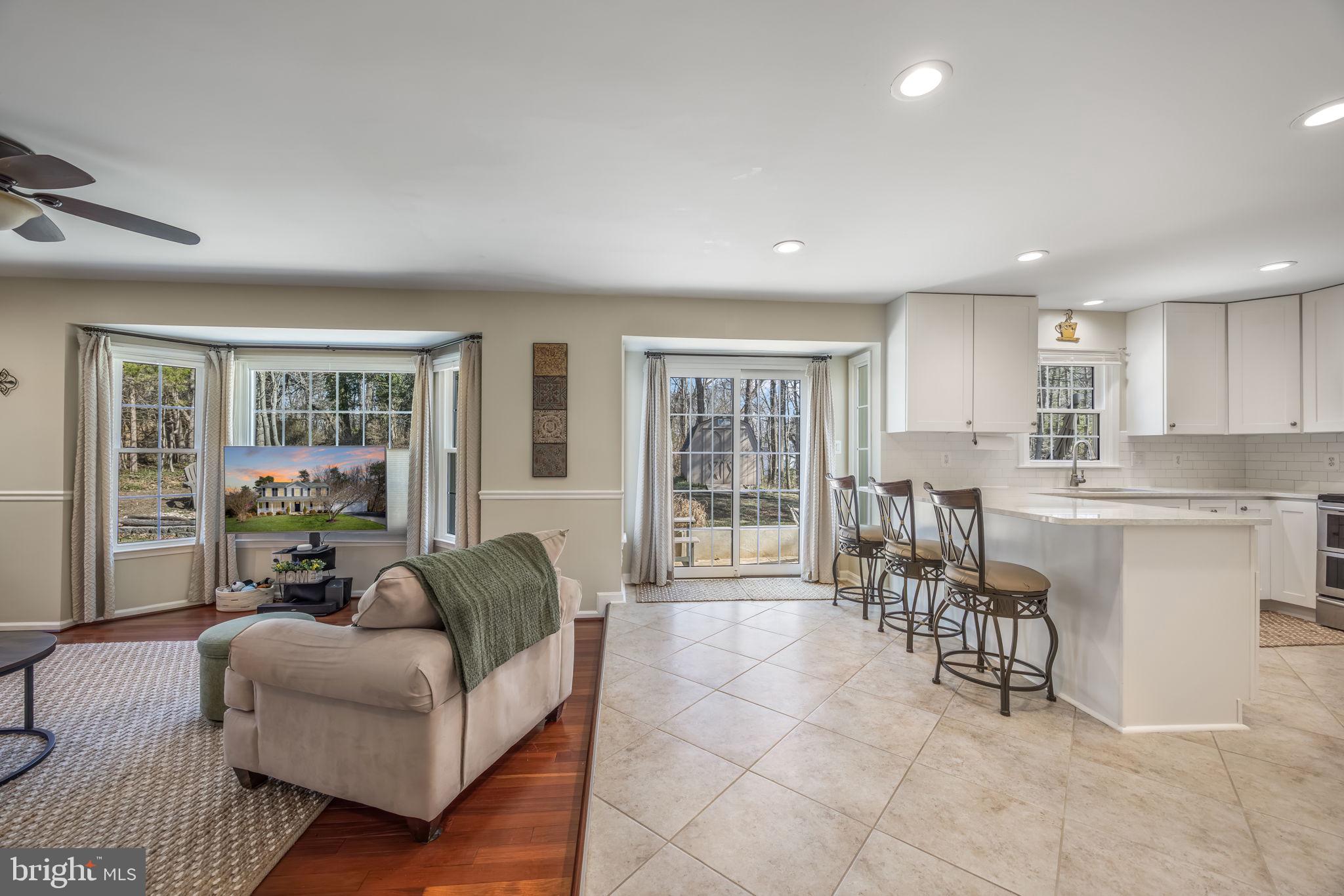 8504 Silverdale Road Lorton, VA 22079 - Photo 15 of 48 a living room with furniture and windows