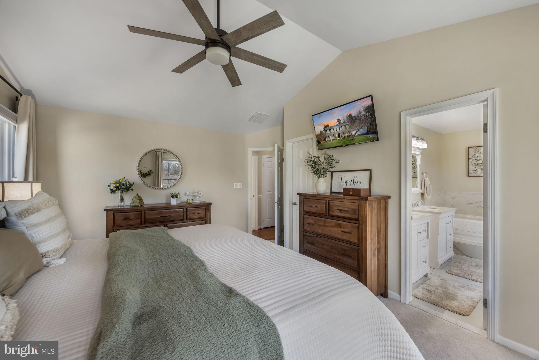 8504 Silverdale Road Lorton, VA 22079 - Photo 25 of 48 a bedroom with a bed and furniture