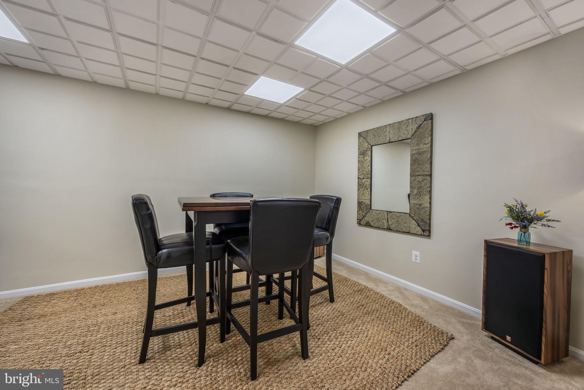 8504 Silverdale Road Lorton, VA 22079 - Photo 33 of 48 a view of a dining room with furniture