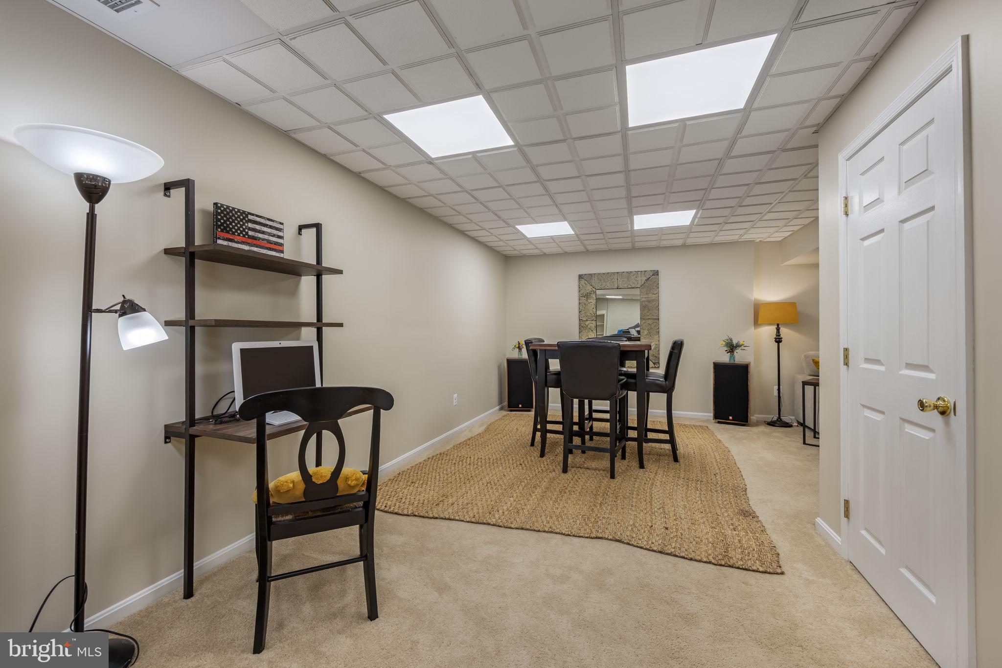 8504 Silverdale Road Lorton, VA 22079 - Photo 34 of 48 a view of a dining room with furniture