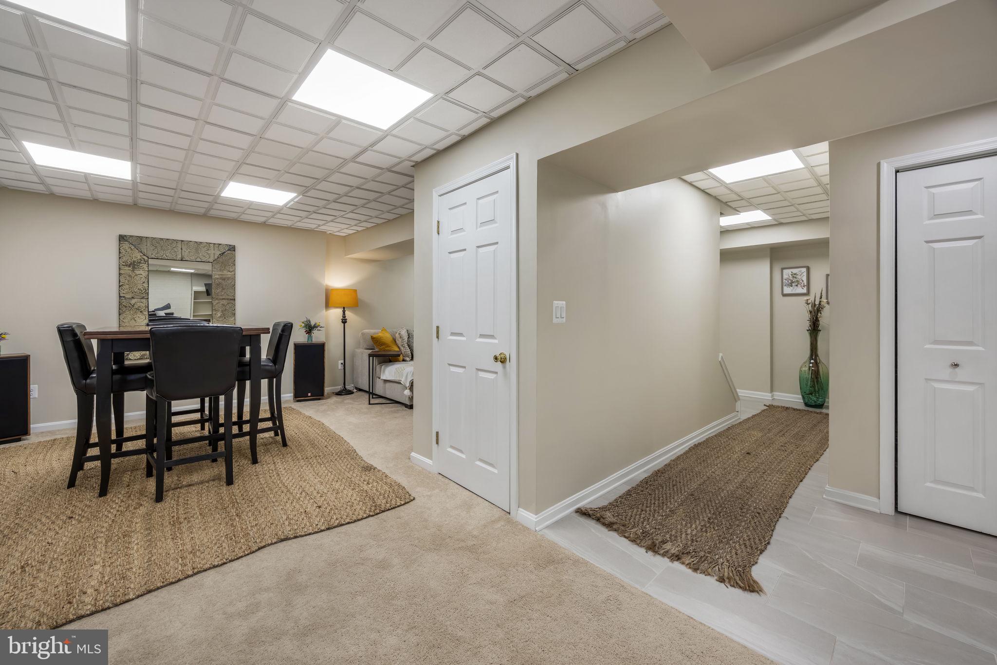8504 Silverdale Road Lorton, VA 22079 - Photo 36 of 48 a view of a dining room with furniture