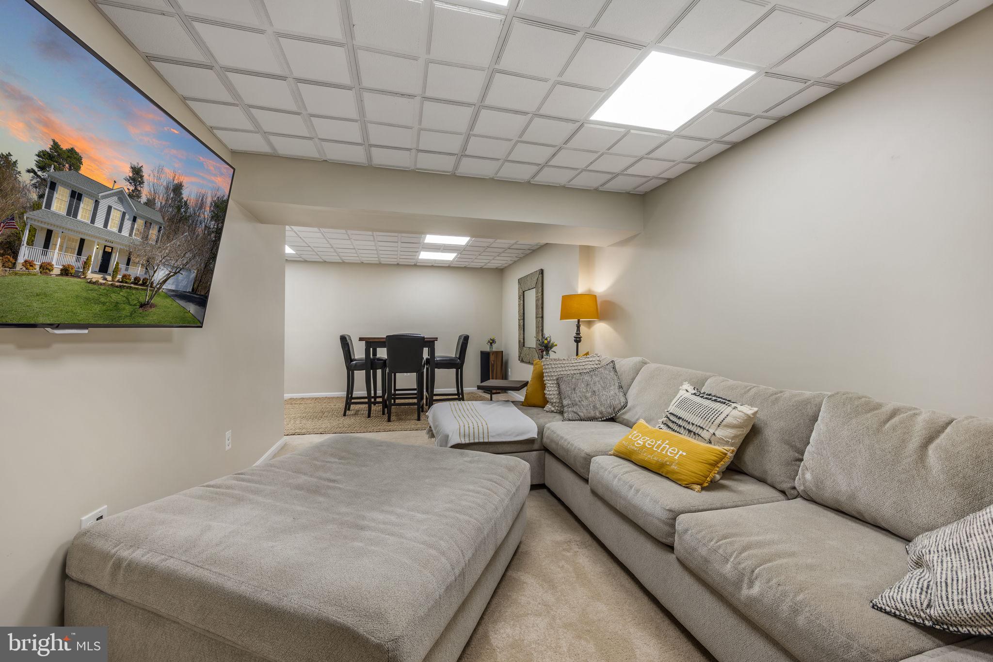 8504 Silverdale Road Lorton, VA 22079 - Photo 39 of 48 a living room with furniture and a couch