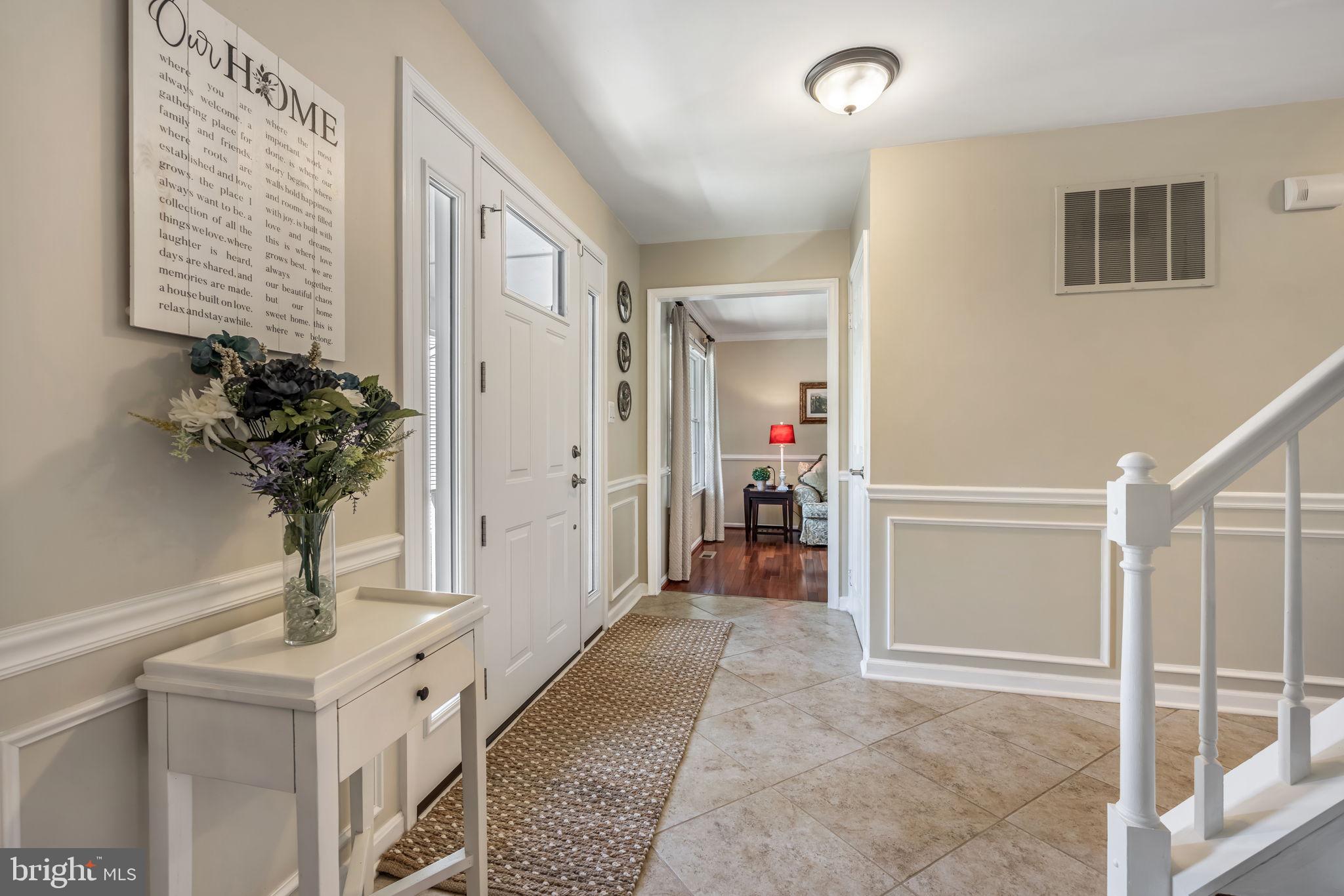 8504 Silverdale Road Lorton, VA 22079 - Photo 5 of 48 a view of entryway with livingroom