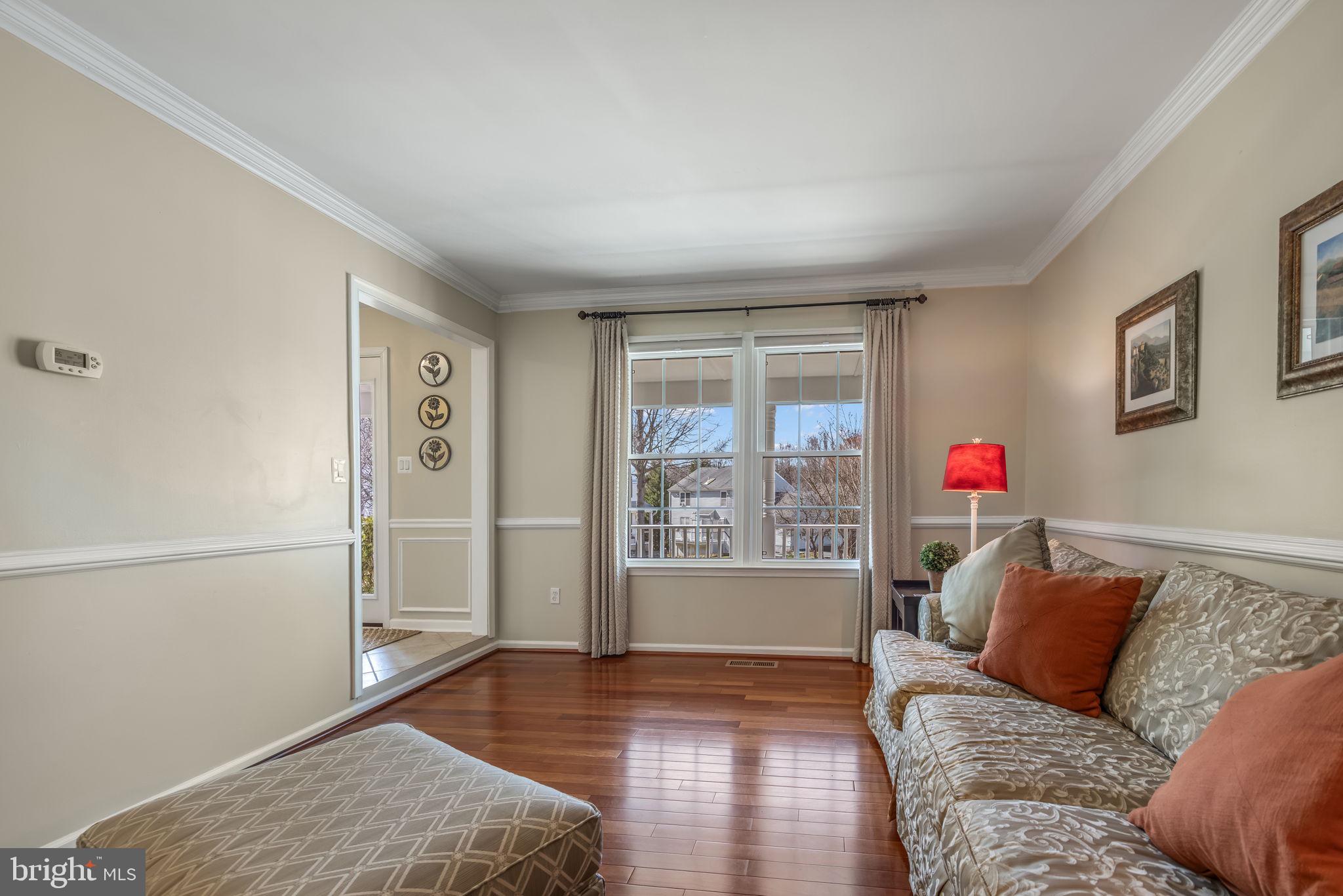 8504 Silverdale Road Lorton, VA 22079 - Photo 9 of 48 a living room with furniture and a window