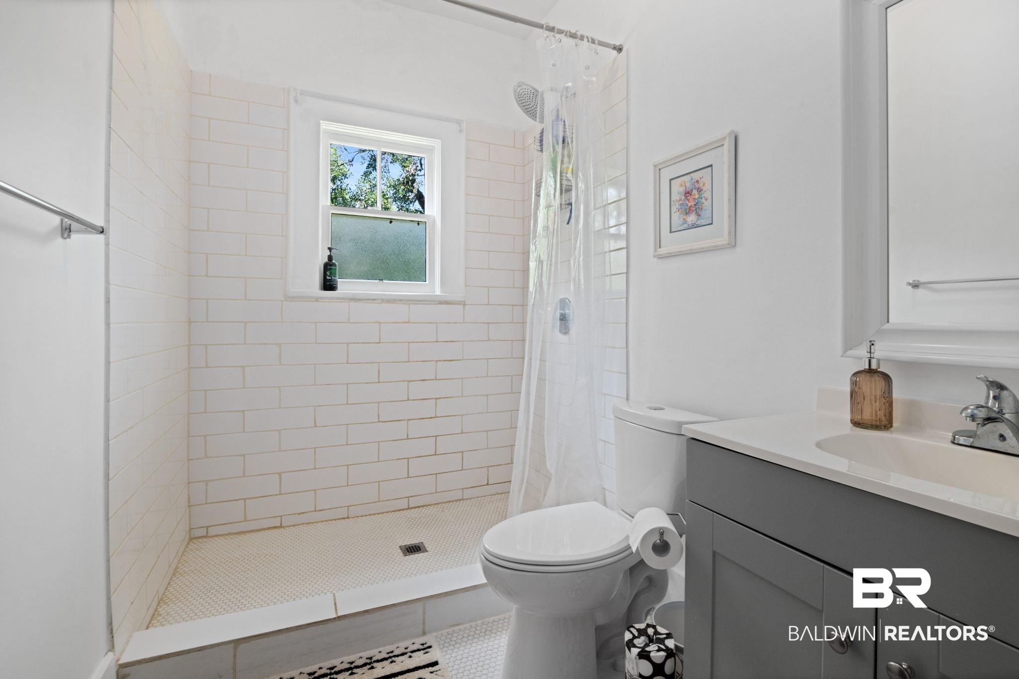 324 4th Street Mobile, AL 36611 - Photo 27 of 28 Bathroom with vanity, walk in shower, and toilet