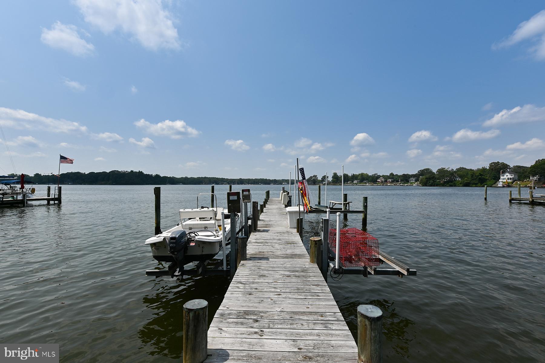 344 Hunner Road Pasadena, MD 21122 - Photo 35 of 55 Close up of pier with lifts