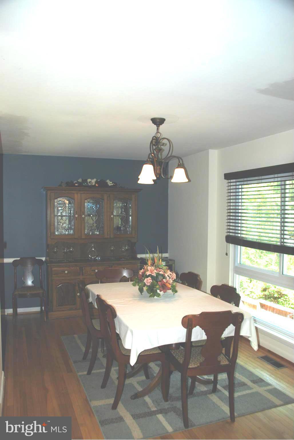11019 Saffold Way Reston, VA 20190 - Photo 13 of 22 a dining room with furniture and window