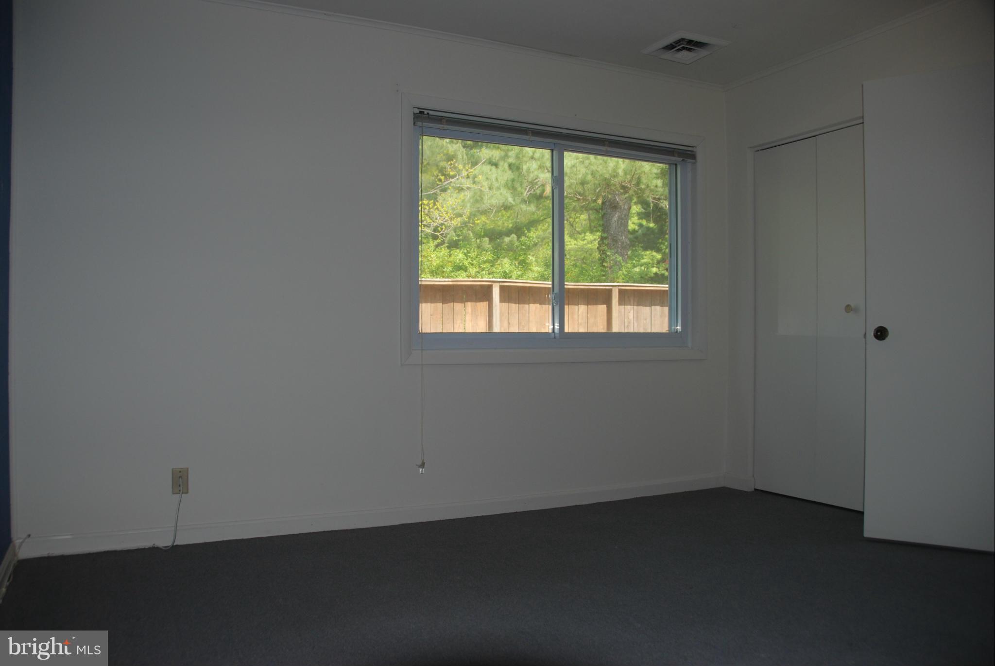 11019 Saffold Way Reston, VA 20190 - Photo 17 of 22 an empty room with a window