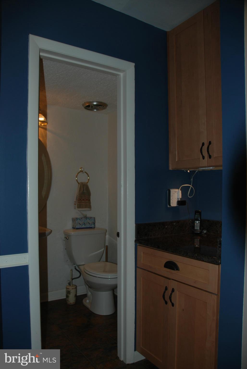 11019 Saffold Way Reston, VA 20190 - Photo 22 of 22 a bathroom with a toilet