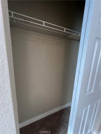 an empty room with staircase