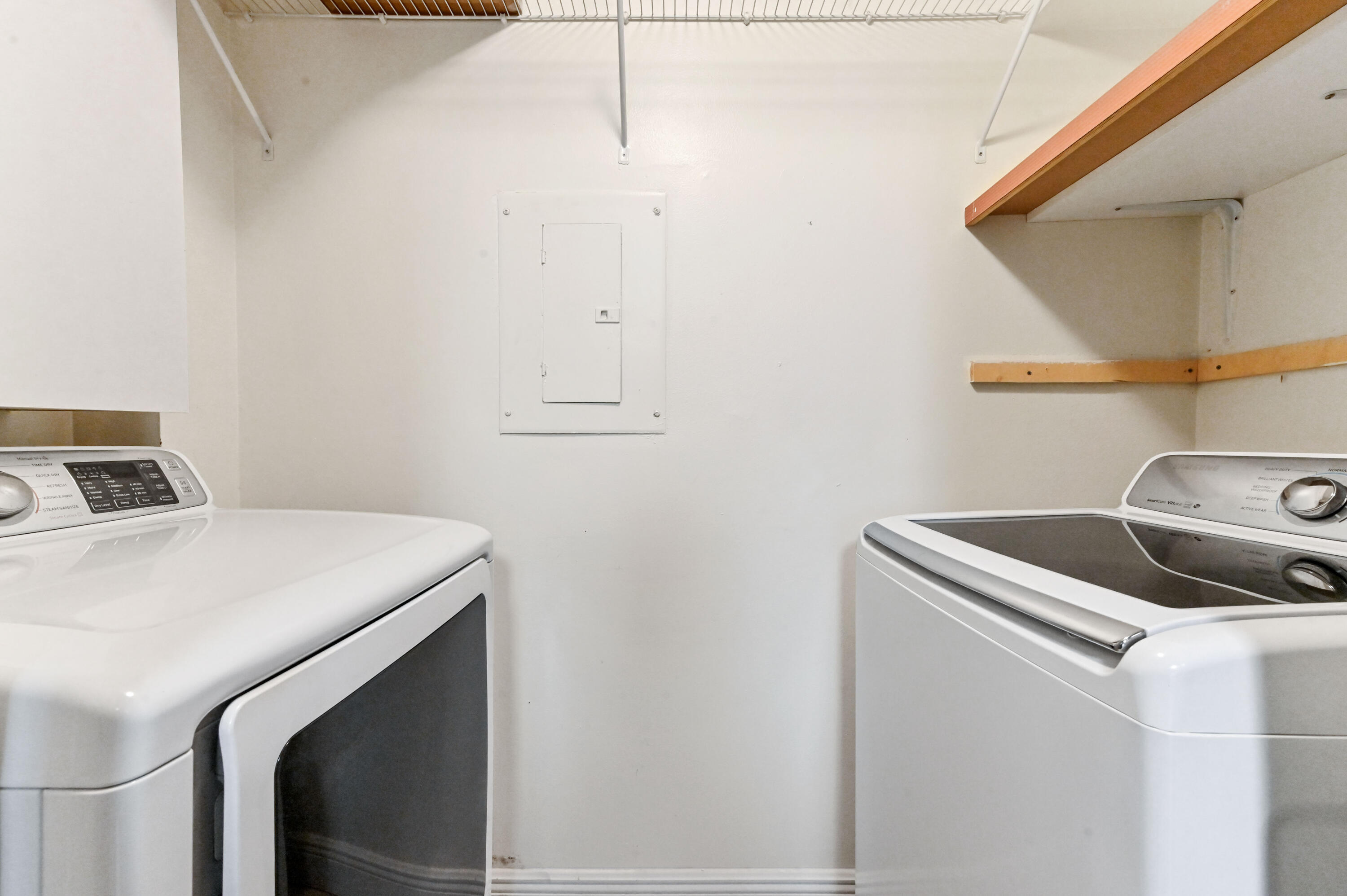 3237 Clint Moore Road, Unit 107 Boca Raton, FL 33496 - Photo 11 of 41 a utility room with dryer and washer