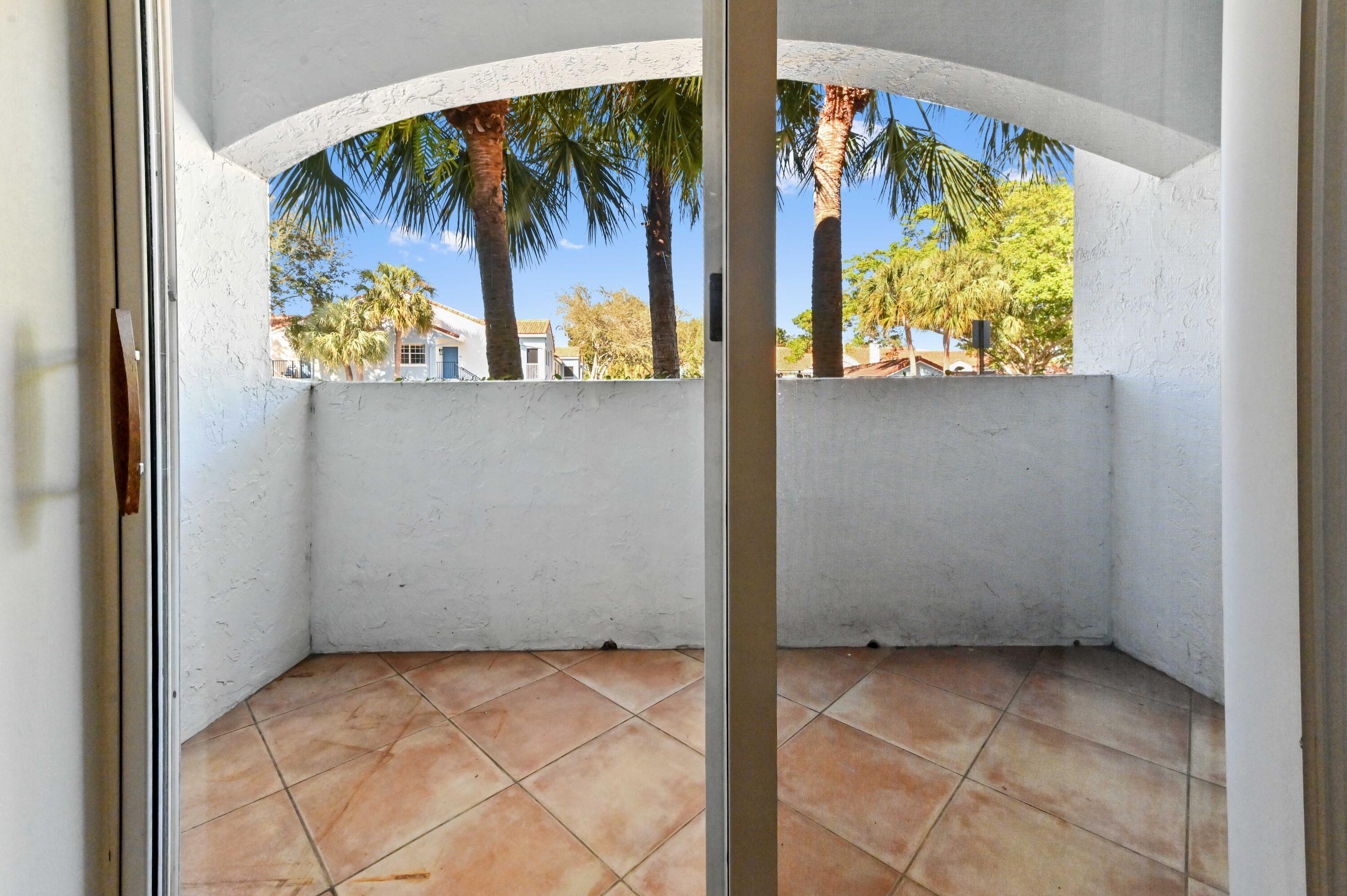 3237 Clint Moore Road, Unit 107 Boca Raton, FL 33496 - Photo 17 of 41 a view of a painting on the wall