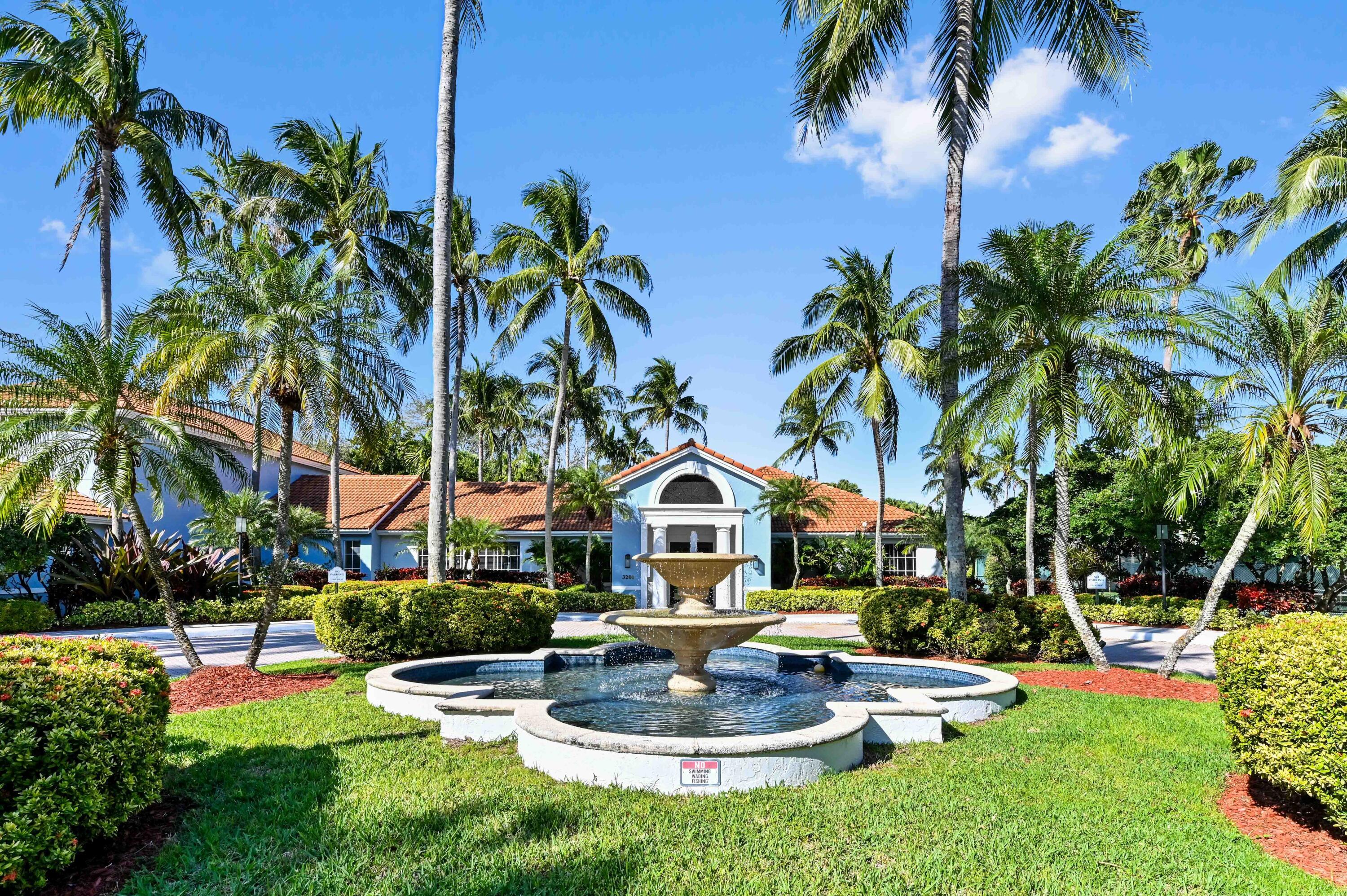 3237 Clint Moore Road, Unit 107 Boca Raton, FL 33496 - Photo 26 of 41 a front view of a house with swimming pool having outdoor seating