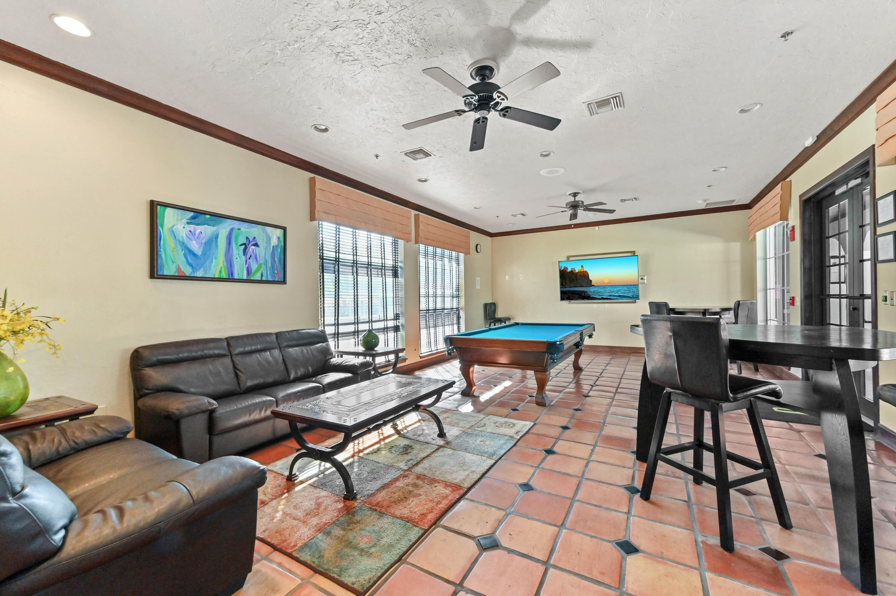 3237 Clint Moore Road, Unit 107 Boca Raton, FL 33496 - Photo 32 of 41 a living room with furniture and a large window