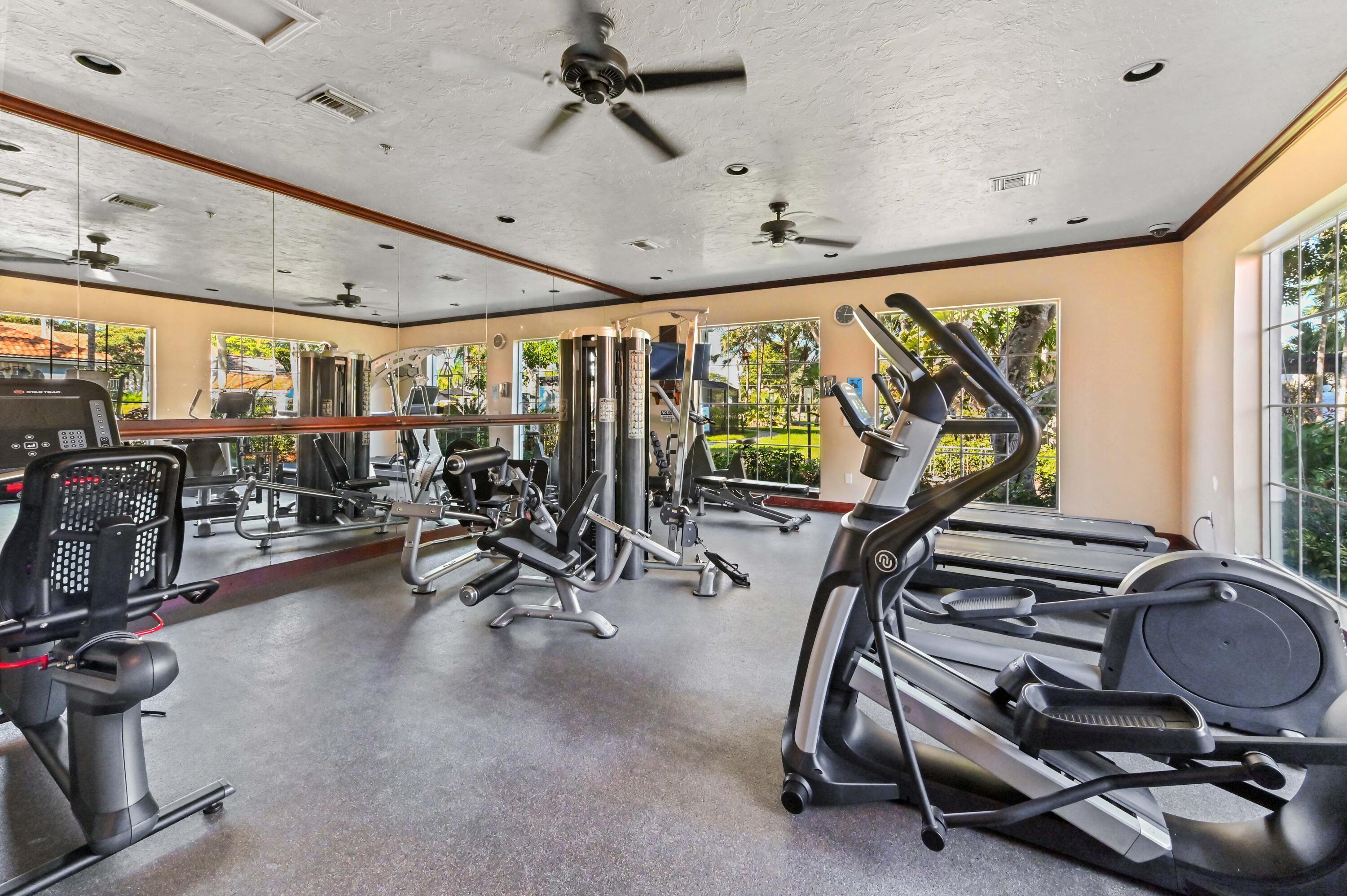 3237 Clint Moore Road, Unit 107 Boca Raton, FL 33496 - Photo 35 of 41 a view of a room with gym equipment