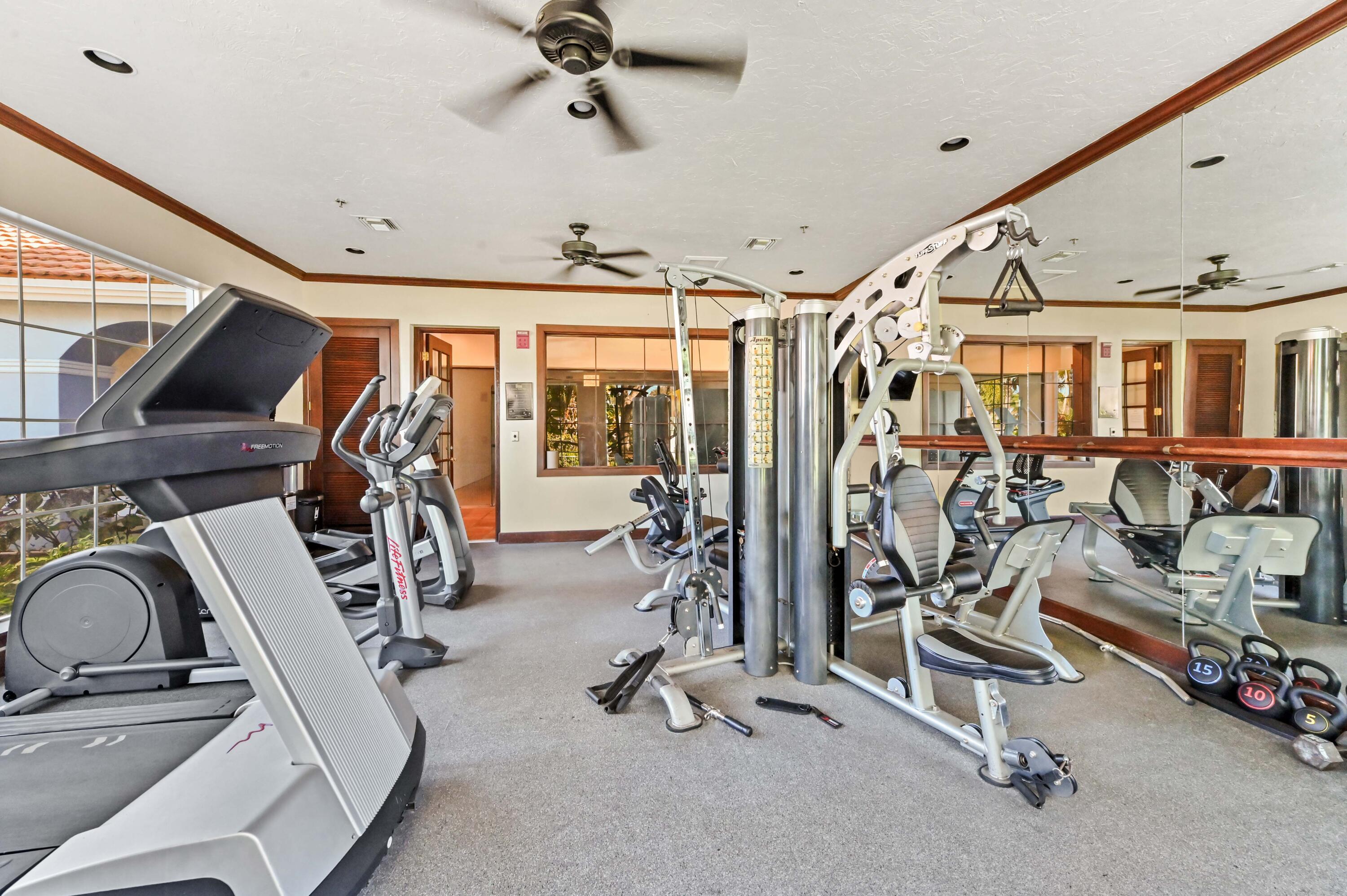 3237 Clint Moore Road, Unit 107 Boca Raton, FL 33496 - Photo 36 of 41 a view of a room with gym equipment