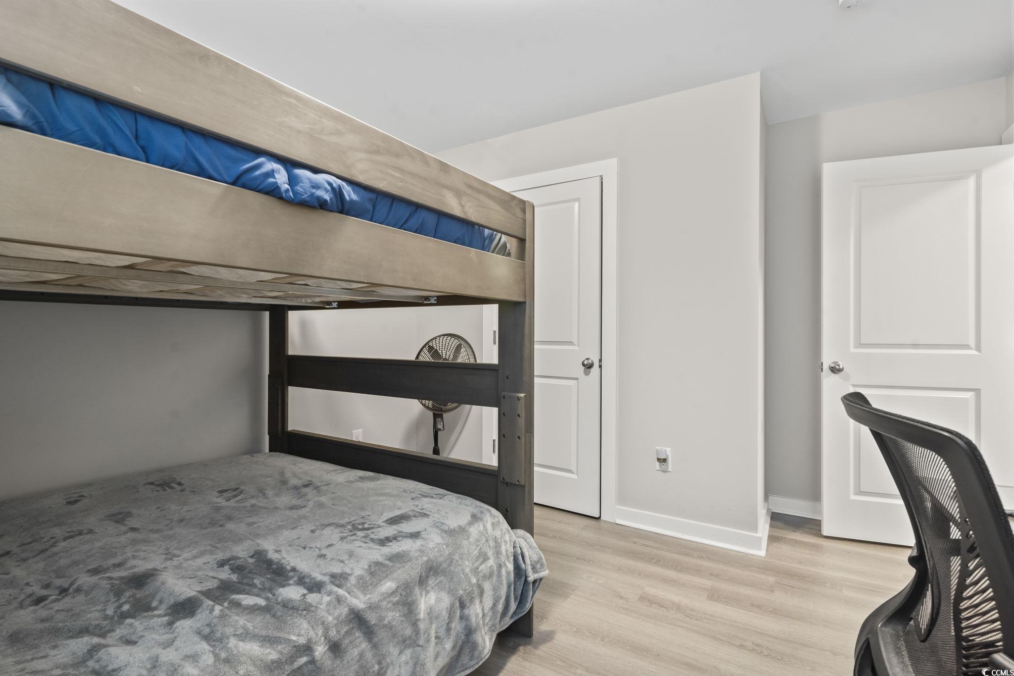 2715 Biscane Court Conway, SC 29527 - Photo 14 of 18 Bedroom with light wood-style flooring and baseboards