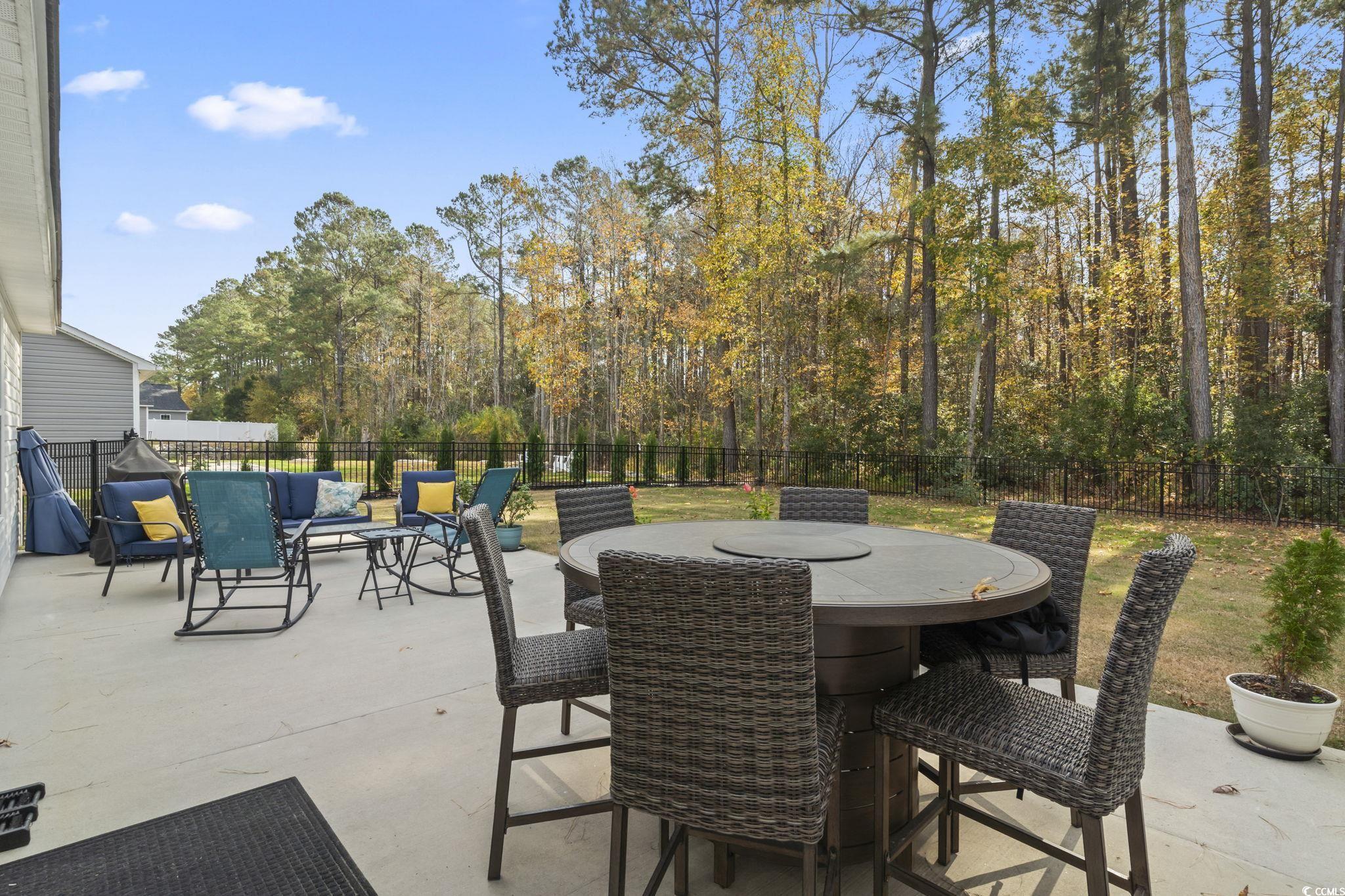 2715 Biscane Court Conway, SC 29527 - Photo 15 of 18 Fenced backyard with outdoor dining space, a patio, and outdoor lounge area