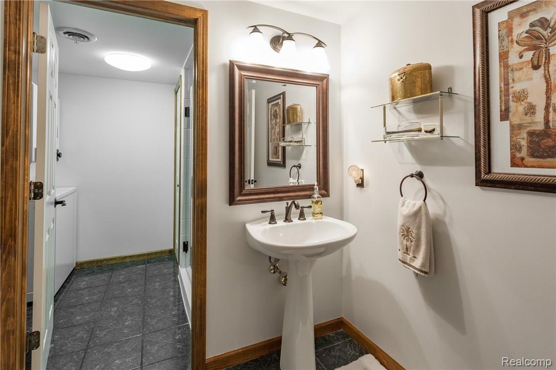 1110 Ridgeway Drive Rochester, MI 48307 - Photo 35 of 44 Basement Full Bath with Additional Laundry Room