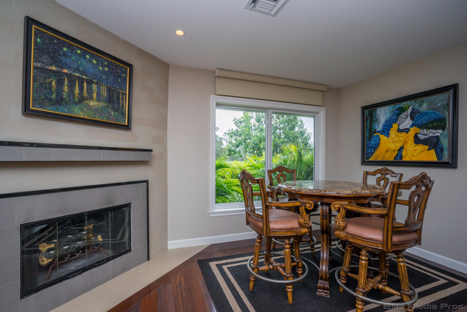 106 Golfview Drive Jupiter, FL 33469 - Photo 19 of 43 Breakfast Area / Fireplace
