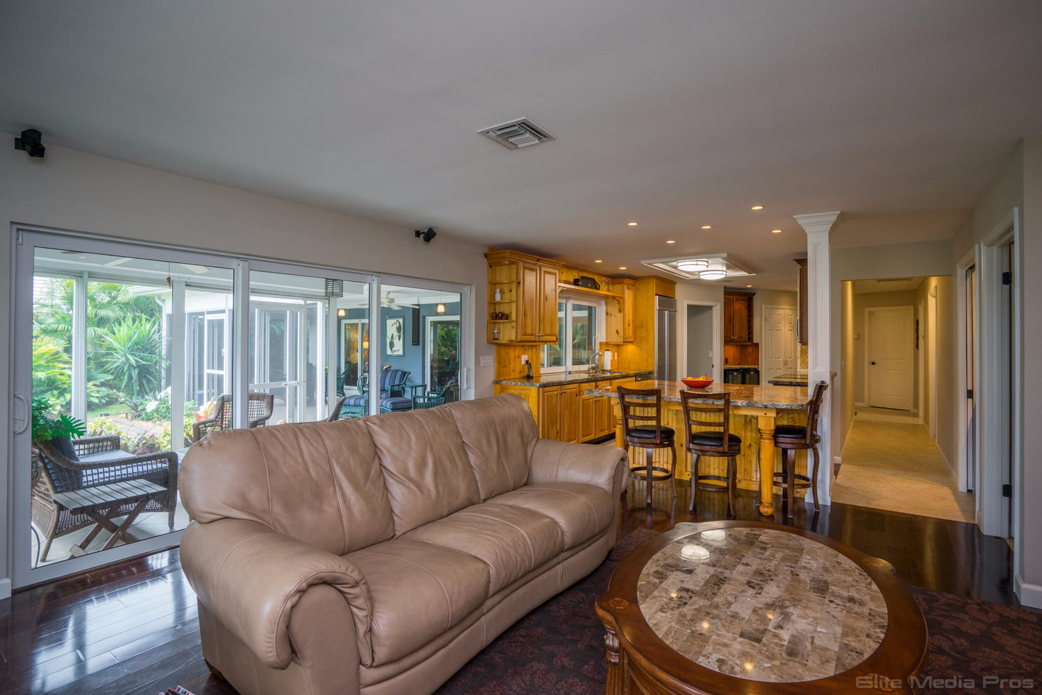 106 Golfview Drive Jupiter, FL 33469 - Photo 22 of 43 Family Room to Kitchen