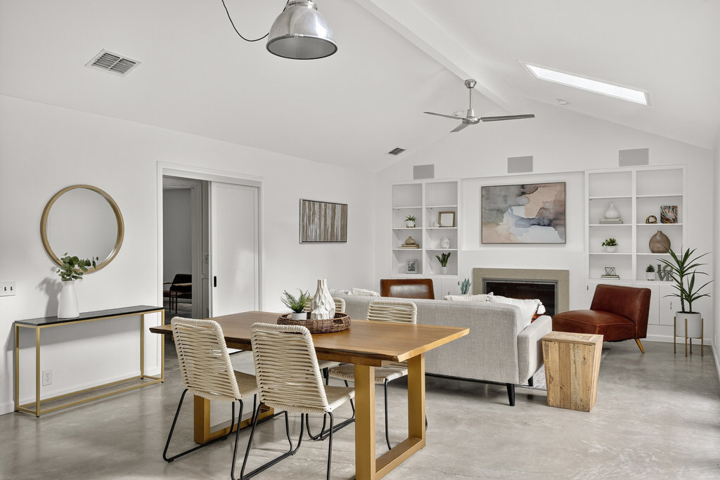 2202 Cypress Point East Austin, TX 78746 - Photo 18 of 36 The dining area overlooks the family room.