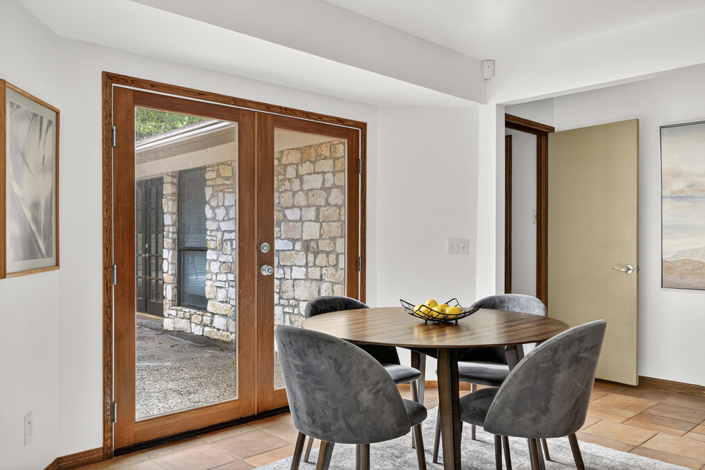 2202 Cypress Point East Austin, TX 78746 - Photo 26 of 36 Patio access creates an ideal set-up to step outside and grill.