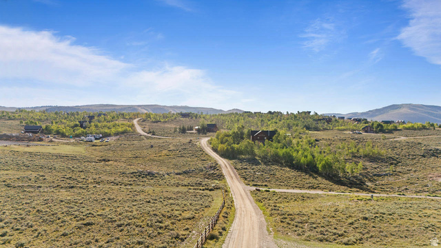 61 Skyline, Unit 61 Helper, UT 84526 - Photo 22 of 31 Expansive landscape featuring rolling hills and distant mountains under a clear sky