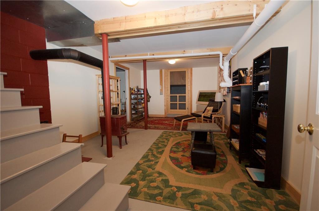 2417 Sennebec Road Appleton, ME 04862 - Photo 12 of 29 Charming basement area with wood...