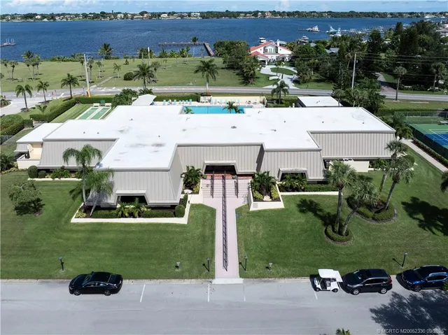 an aerial view of a house with outdoor space and street view
